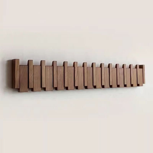Piano-Inspired Coat Rack with Folding Hooks