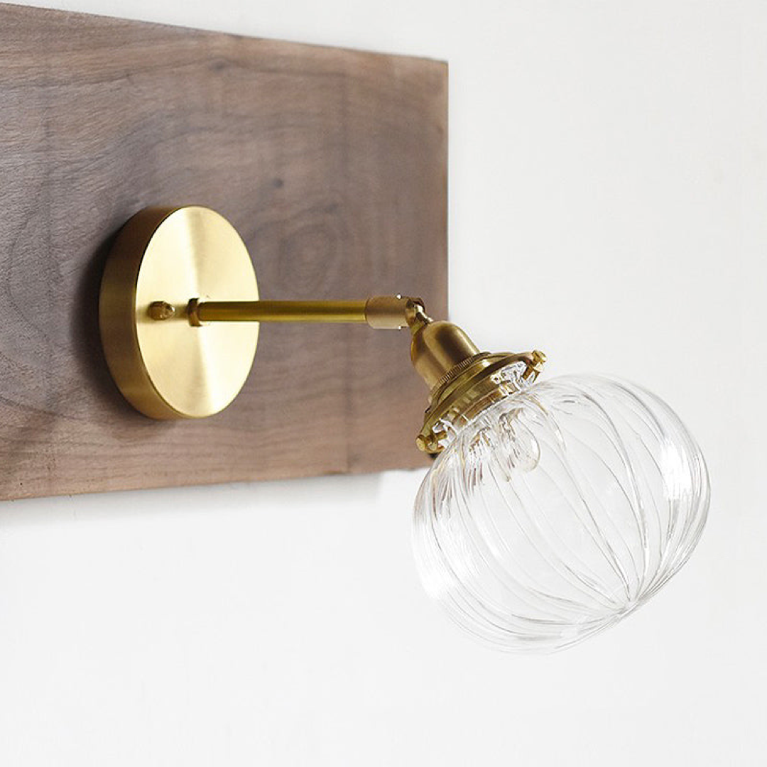 Prismatic Orb Wall Sconce for a Warm Glow