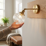 Prismatic Orb Wall Sconce for a Warm Glow