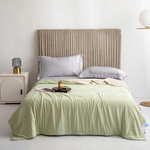 Dual-Sided Cooling Quilt for Restful Sleep