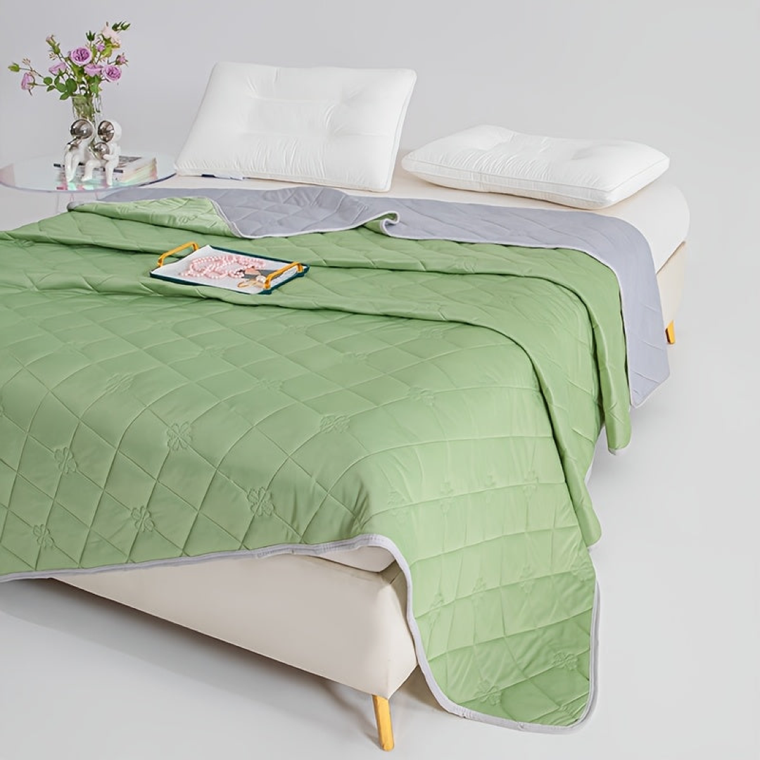 Dual-Sided Cooling Blanket for Restful Sleep