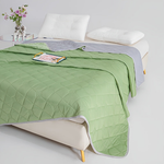 Dual-Sided Cooling Blanket for Restful Sleep