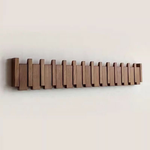 Piano-Inspired Coat Rack with Folding Hooks