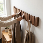 Piano-Inspired Coat Rack with Folding Hooks