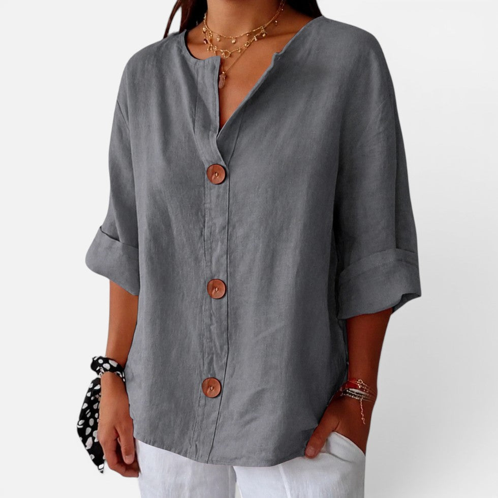 Linen blouse with button placket and half sleeves